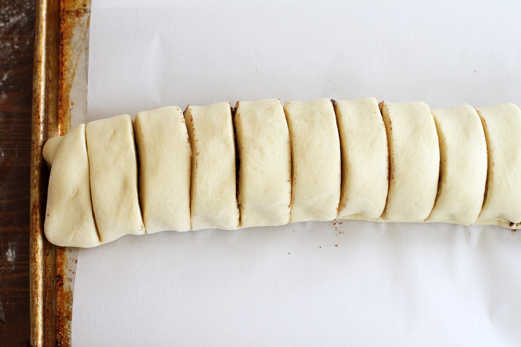 preparing dough on baking sheet