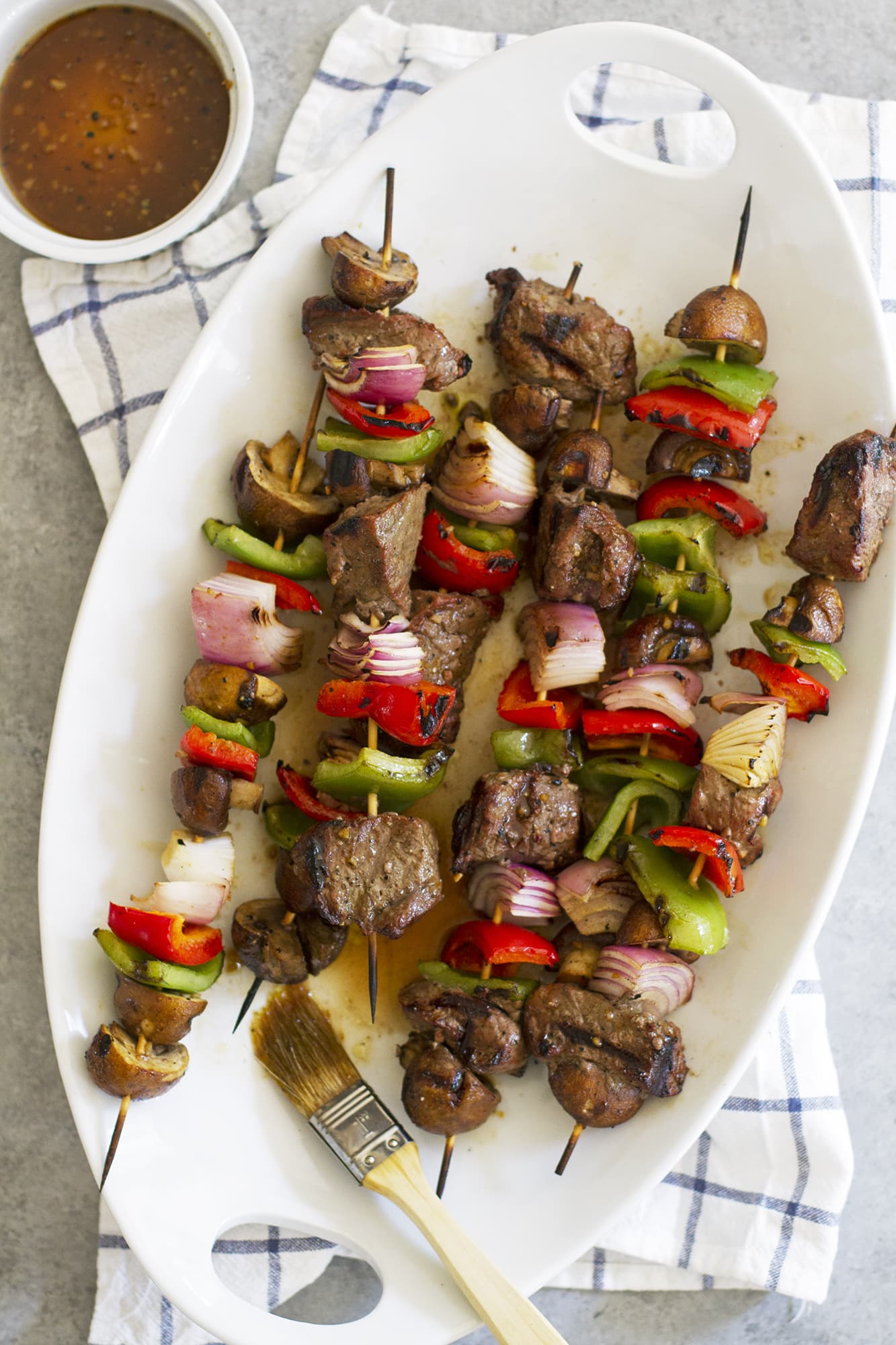 grilled steak mushroom kabobs on platter
