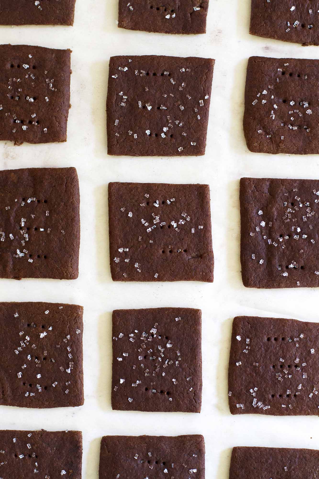 chocolate graham crackers on parchment paper