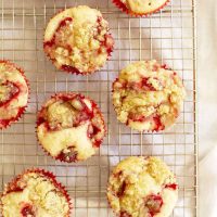 strawberry crumble muffins on cooling rack