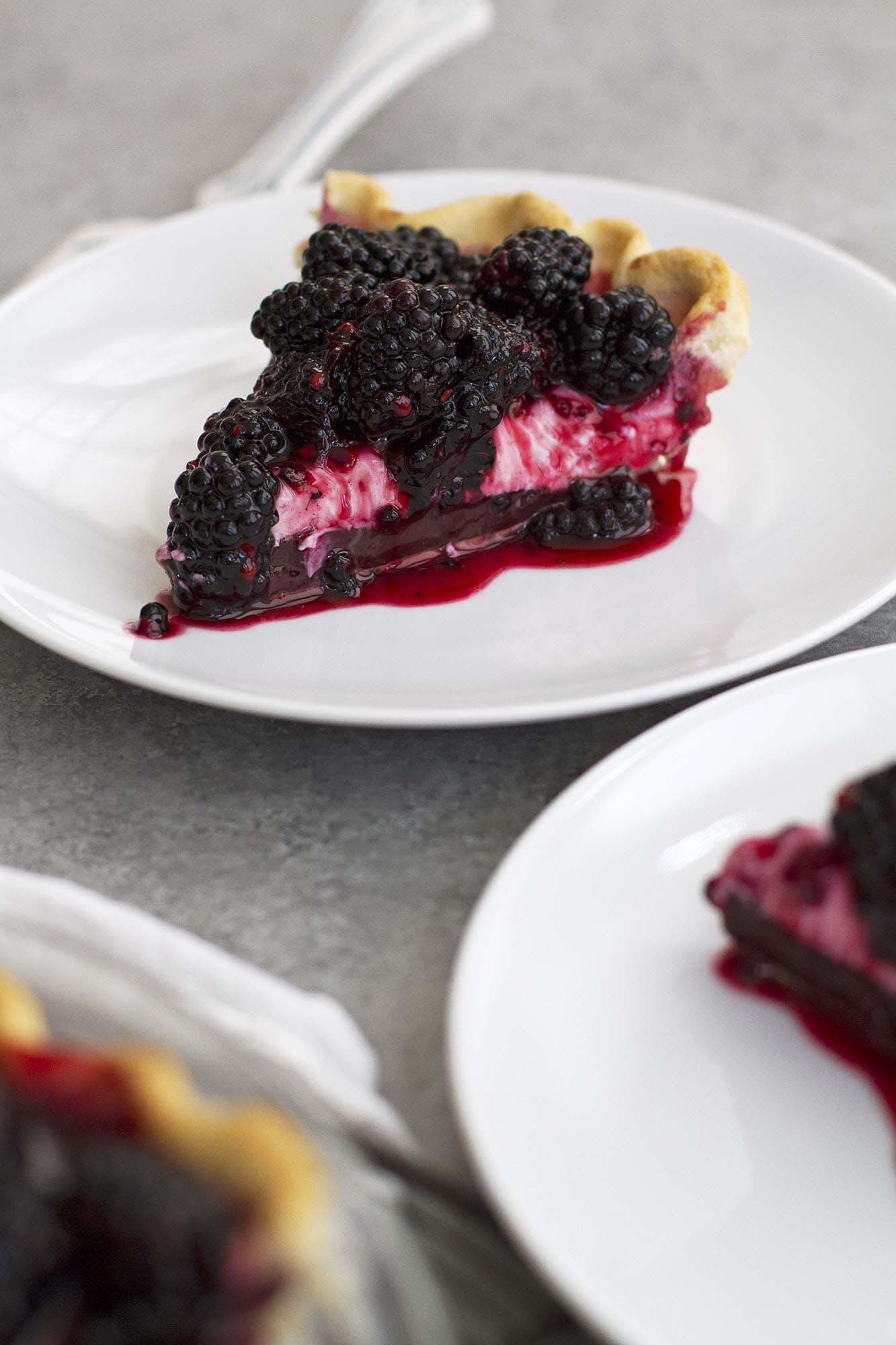 slice of blackberry black bottom pie on plate