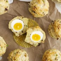breakfast egg cheese muffins on parchment paper