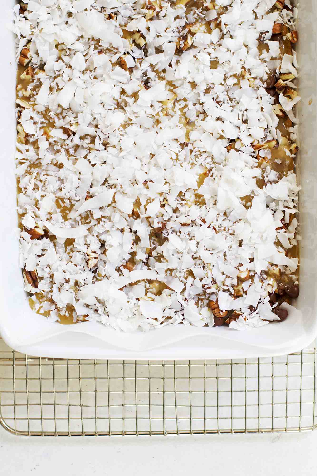adding coconut to chocolate chip bars
