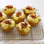 bacon quiche crescent cups on cooling rack.