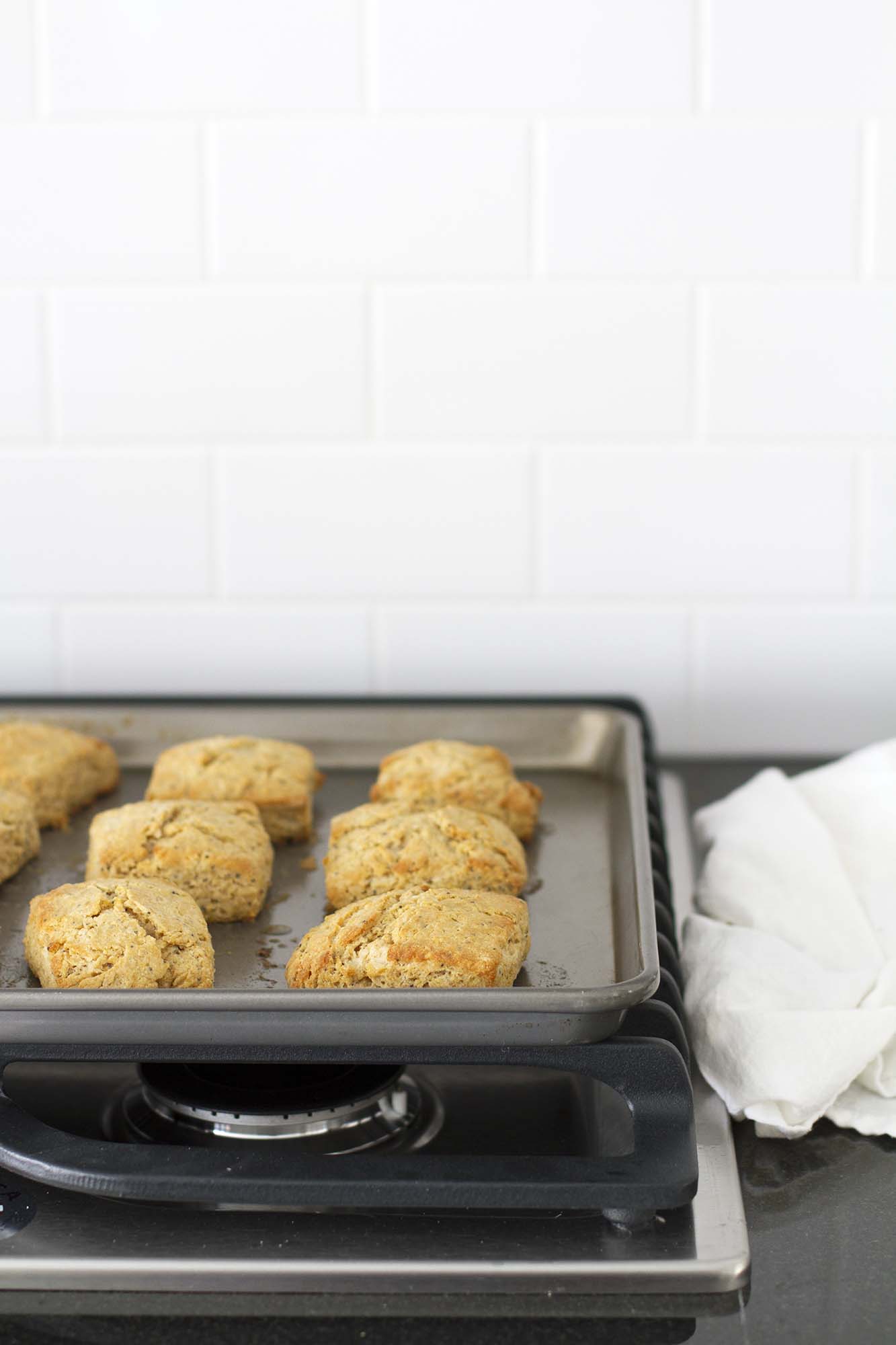 lemon poppy seed biscuits on baking sheet