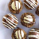 truffle stuffed chocolate chip cookie cups on plate.