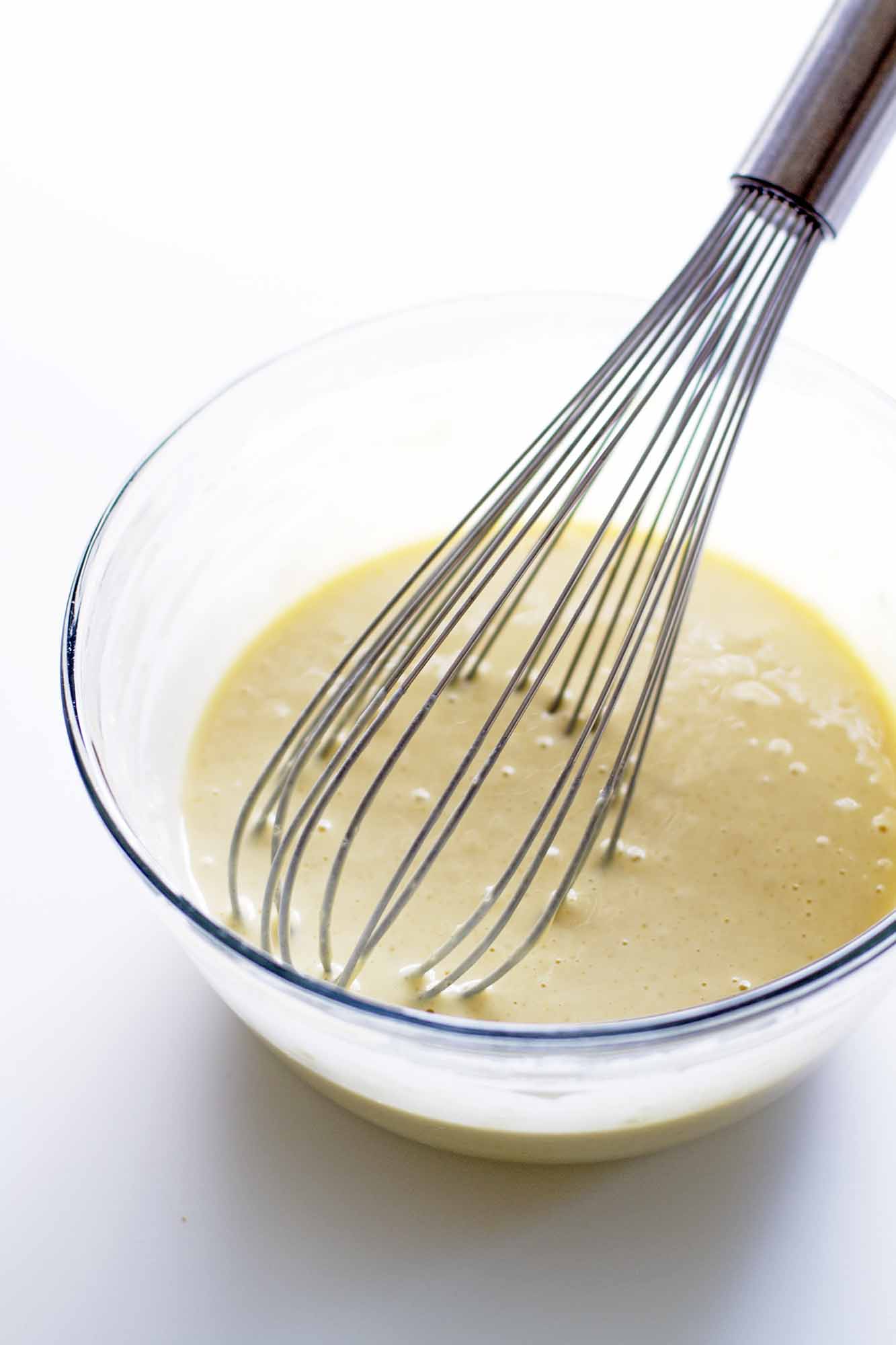 mixing pancake batter in bowl