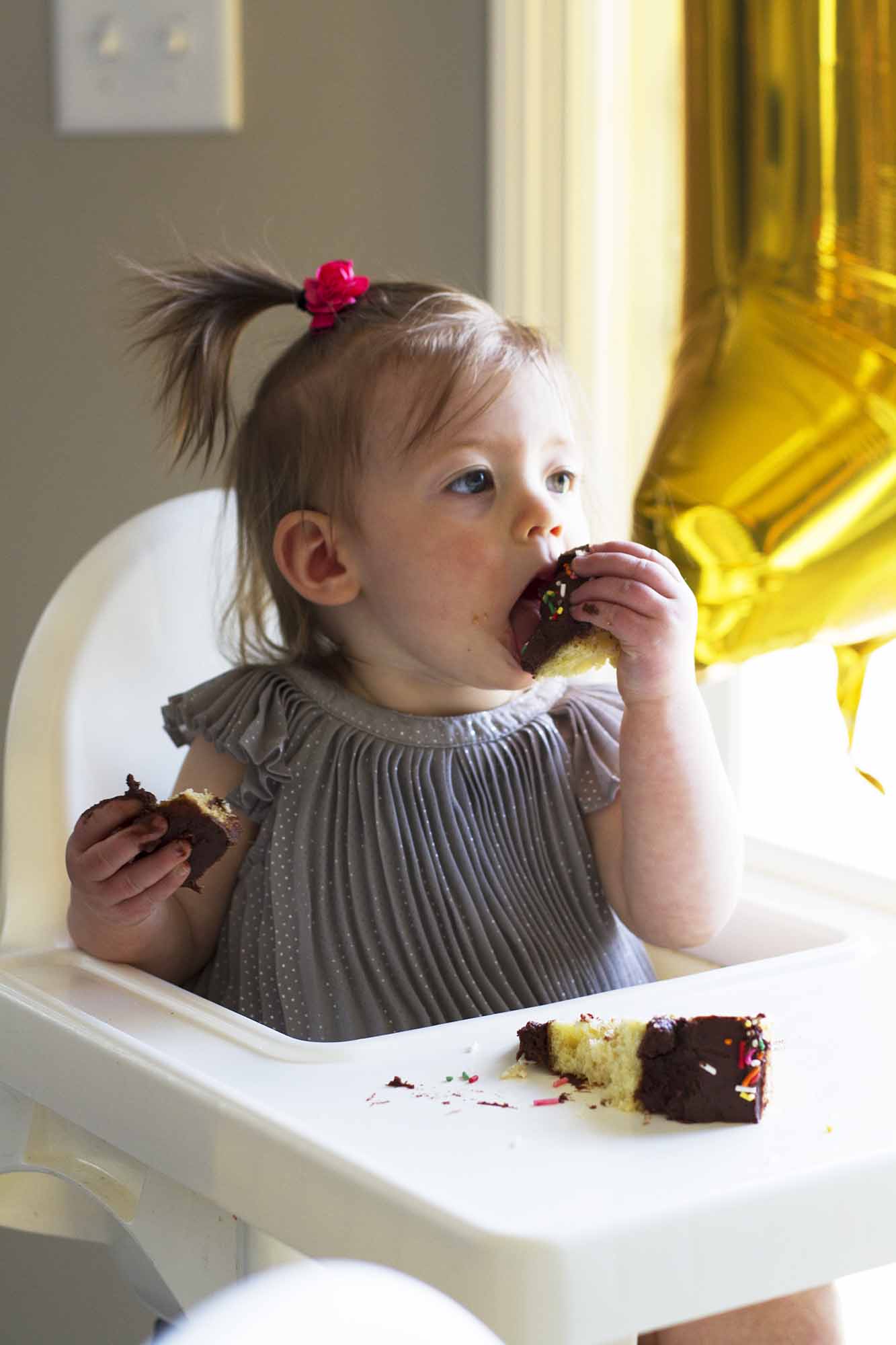 child eating cake