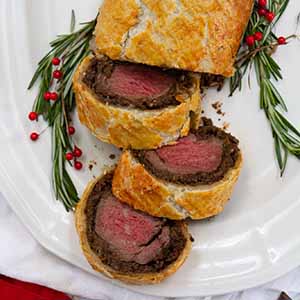 beef wellington on serving platter.