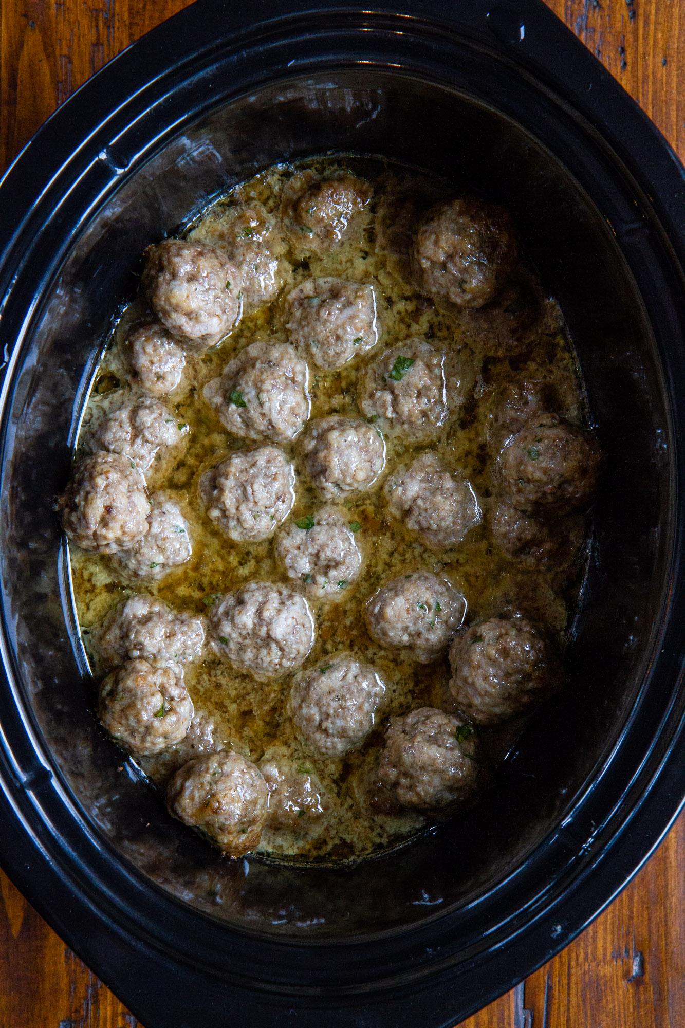 Crockpot Swedish Meatballs -- make this easy slow cooker meatballs recipe for a quick, family-friendly dinner. Everything is made in the crockpot -- even the gravy! @girlversusdough #girlversusdough #slowcooker #crockpotmeal #easydinnerrecipe #easyappetizer