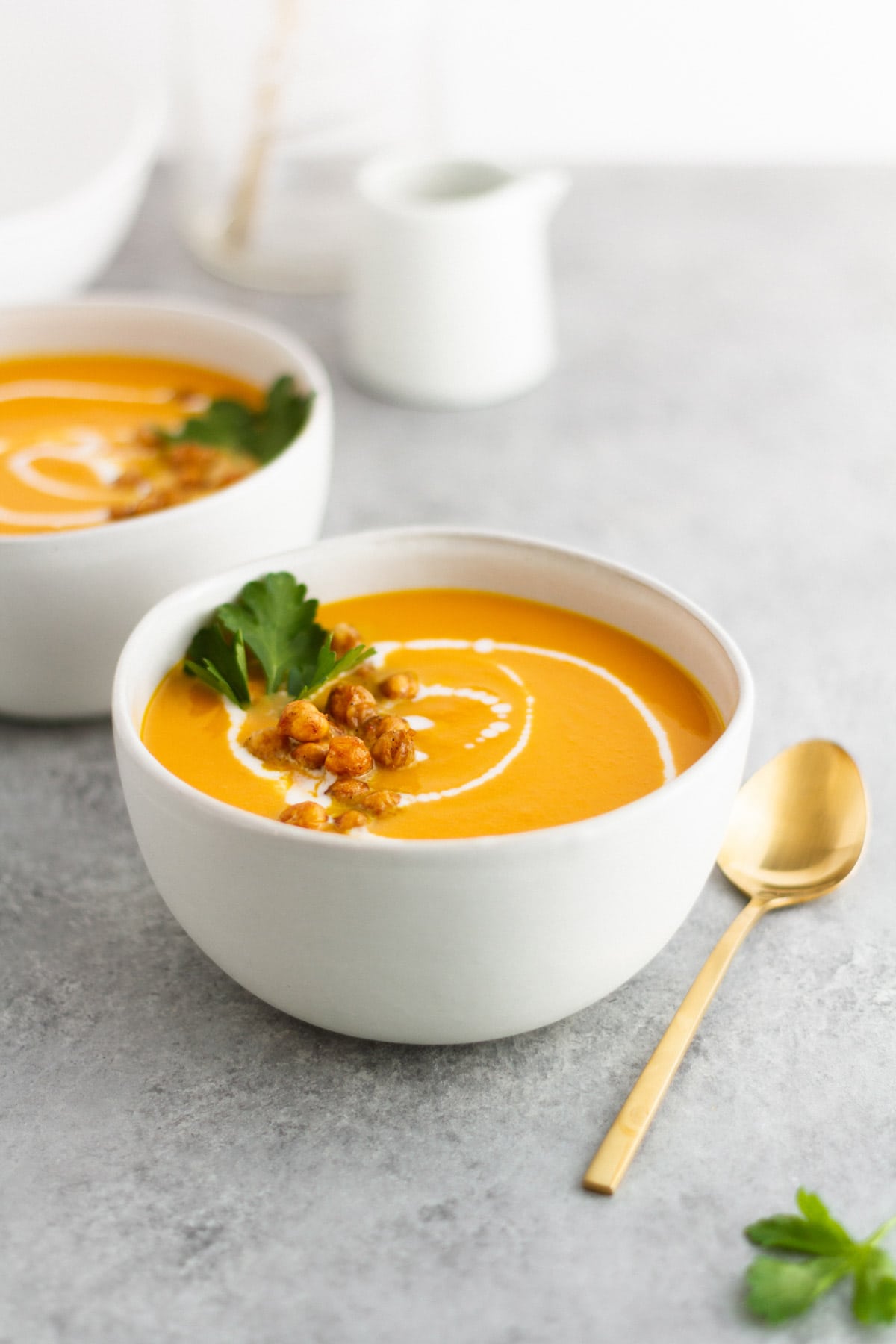 carrot ginger coconut soup in a bowl