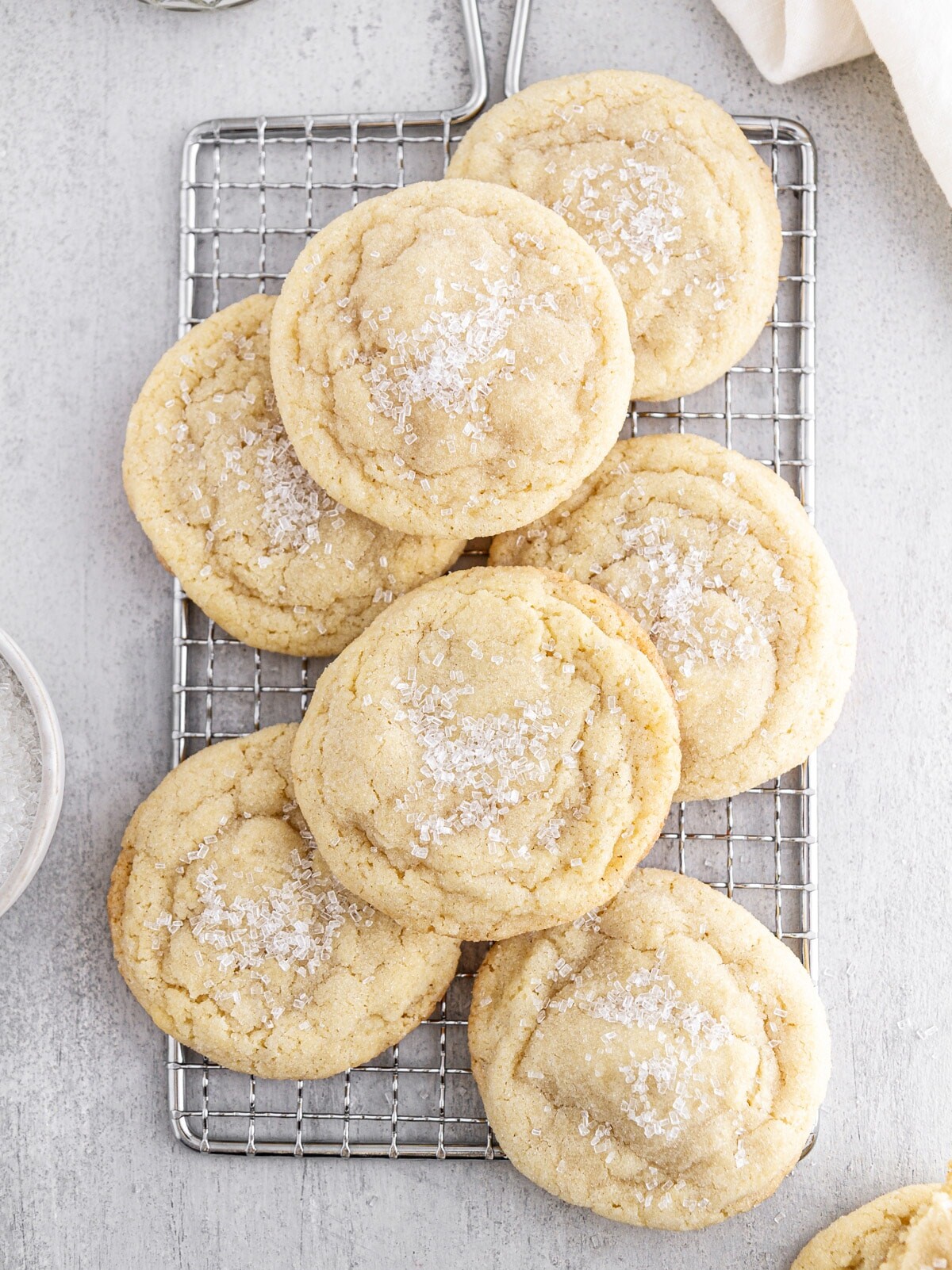 chewy sugar cookies on a cooling rack.