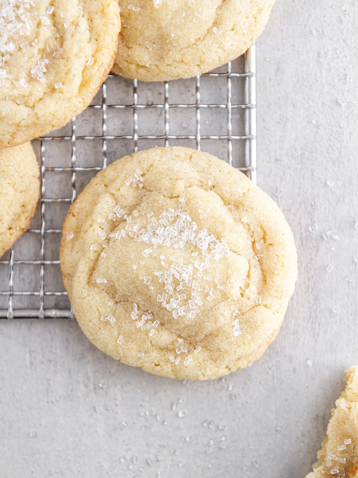 chewy sugar cookies on a cooling rack.