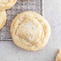 a chewy sugar cookie on a cooling rack