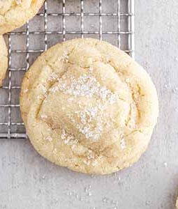 a chewy sugar cookie on a cooling rack