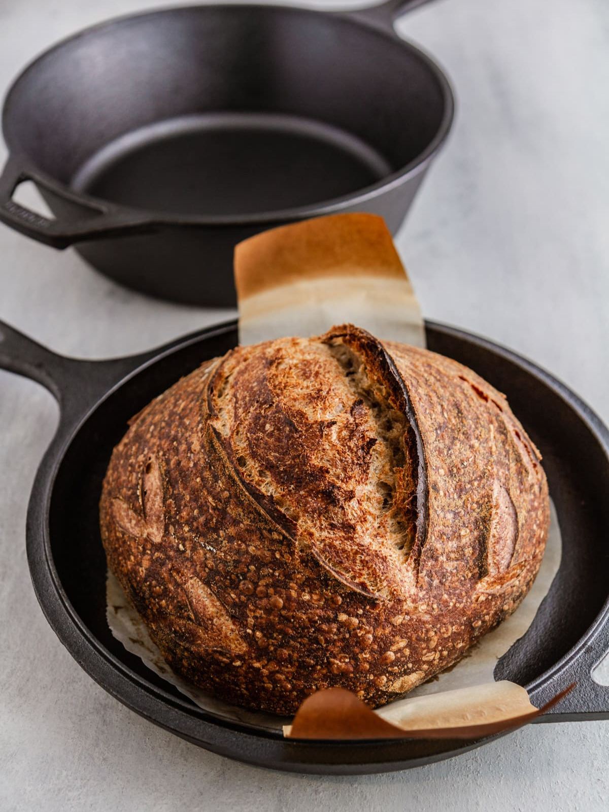 baked sourdough loaf in combo baker.
