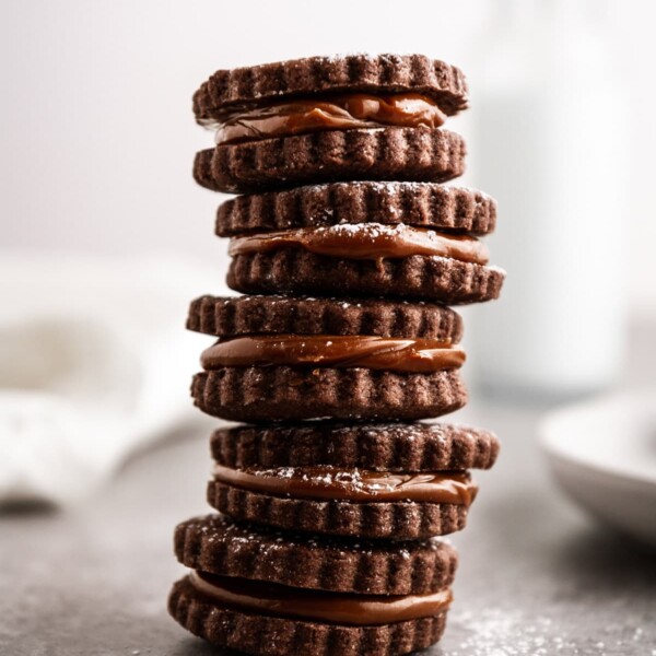 a stacked tower of chocolate alfajores.