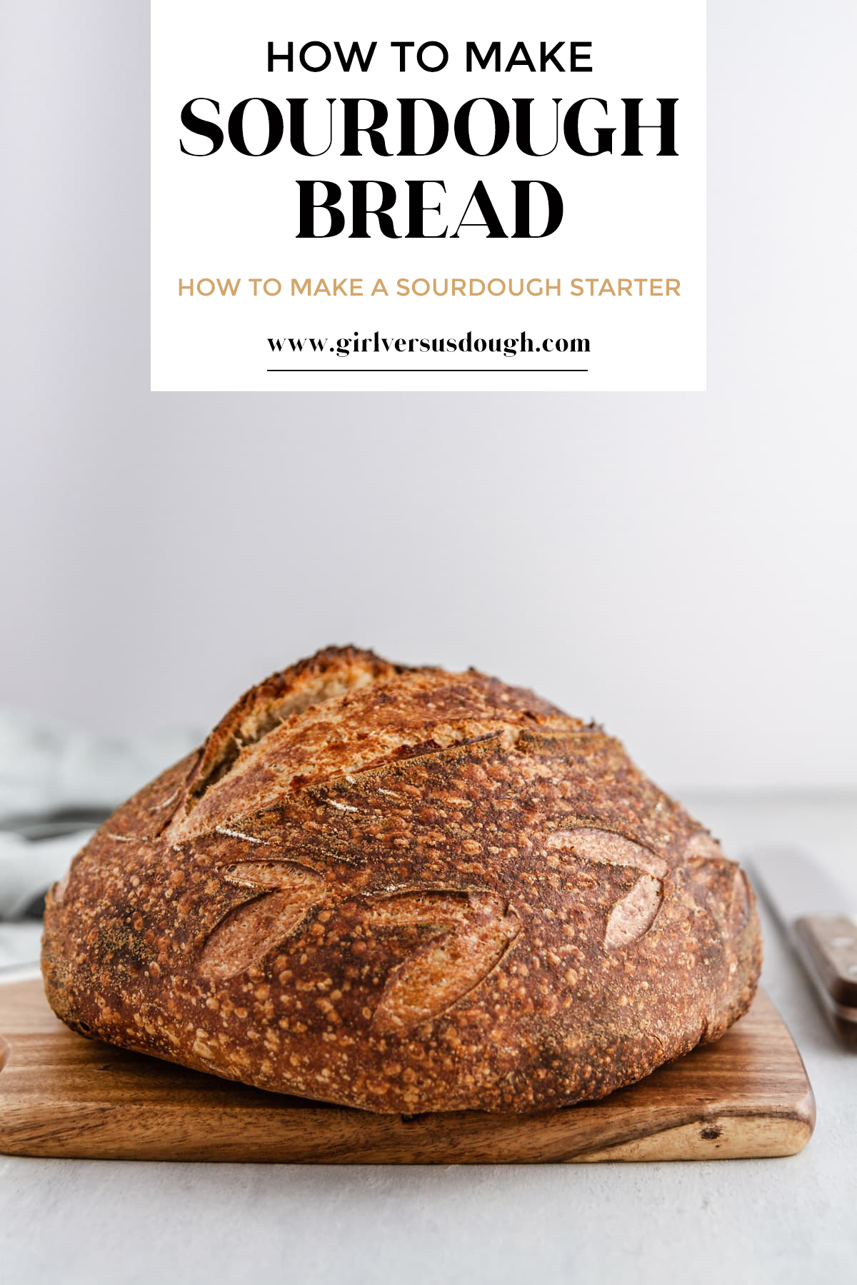 a loaf of sourdough bread on a cutting board