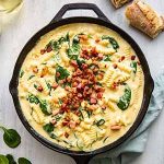 stovetop macaroni and cheese in cast iron pan.