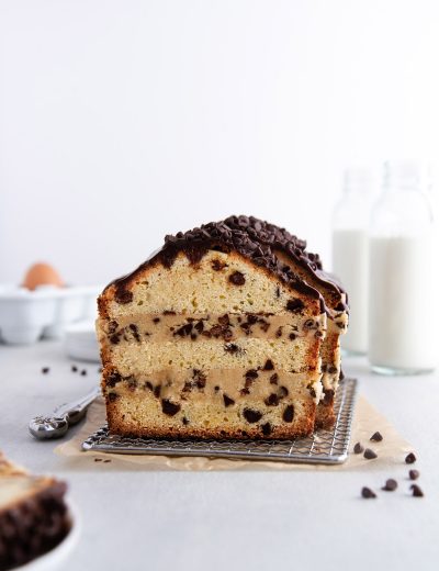 cookie dough stuffed pound cake on a cooling rack