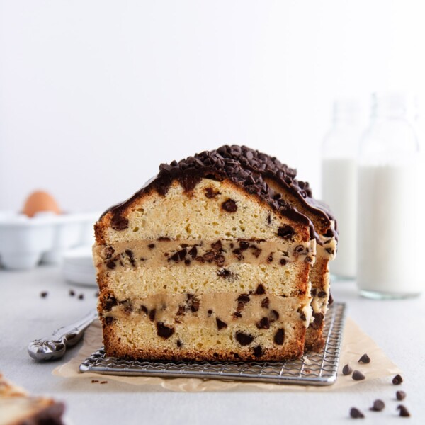 cookie dough stuffed pound cake on a cooling rack.
