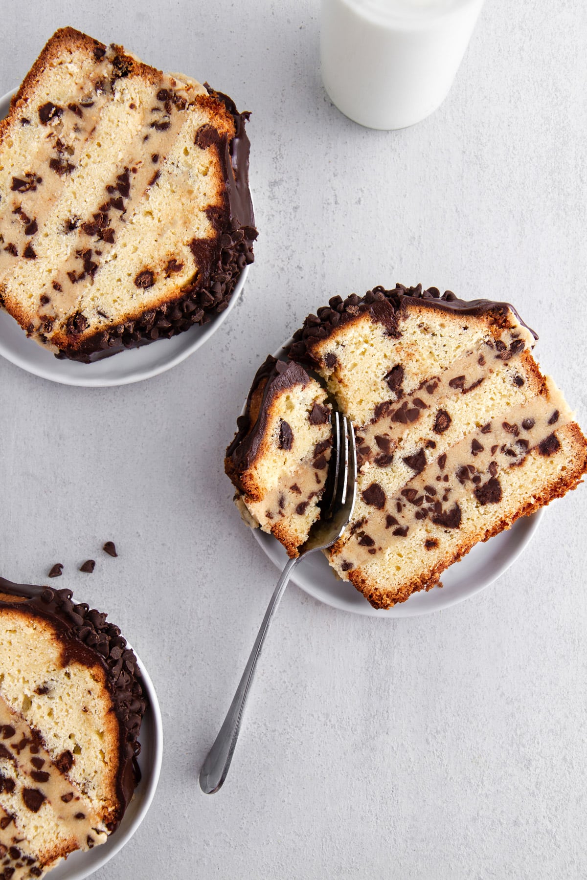 slices of cookie dough stuffed pound cake on plates