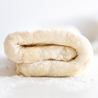 rough puff pastry dough on a surface