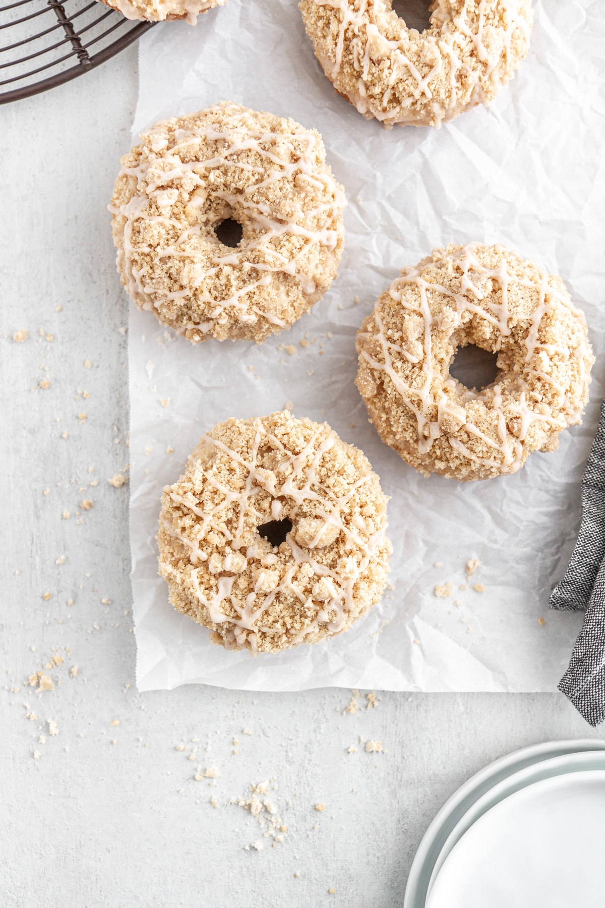 baked maple donuts on parchment paper