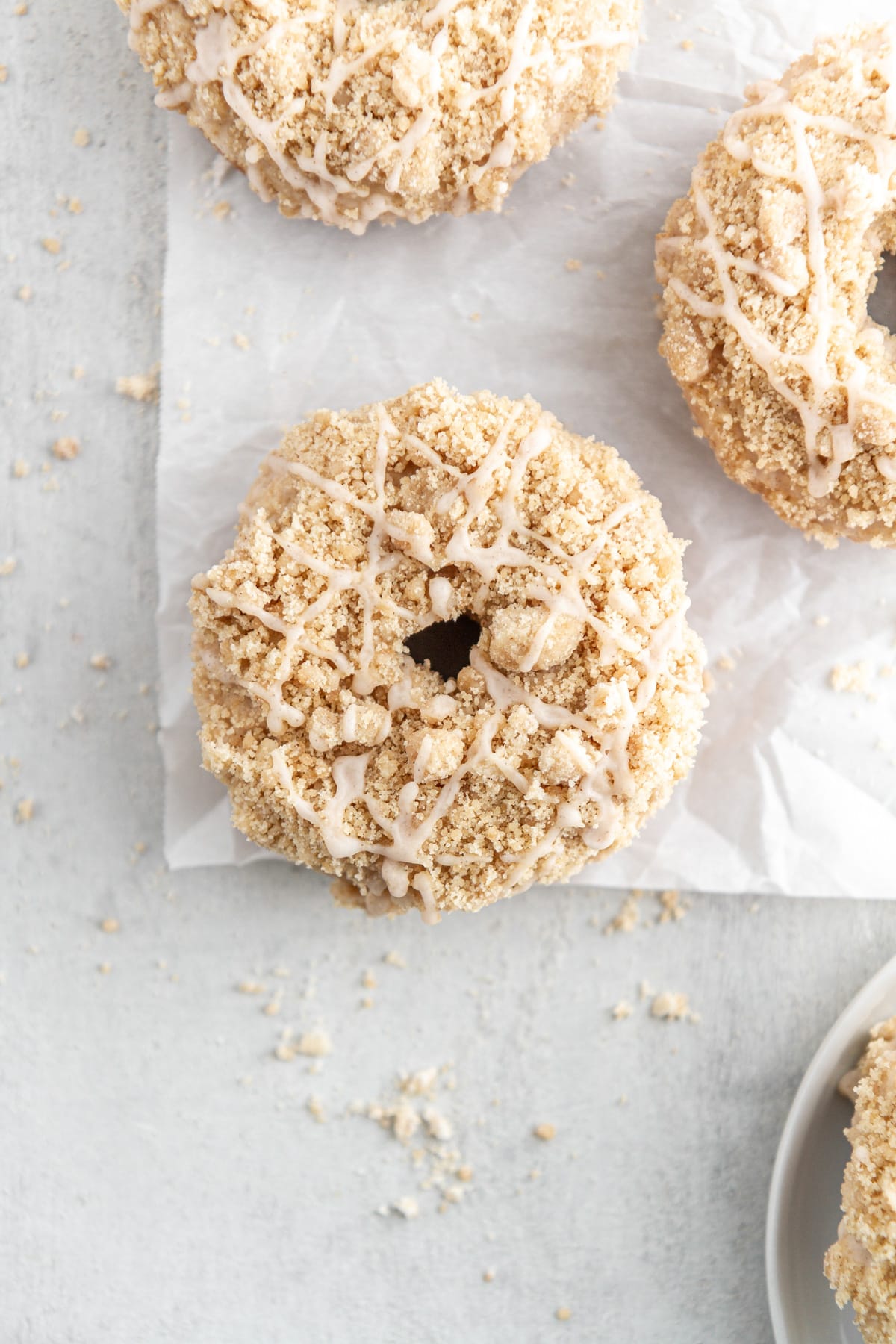 maple donuts on parchment paper