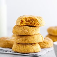 stack of pumpkin snickerdoodles on a cooling rack