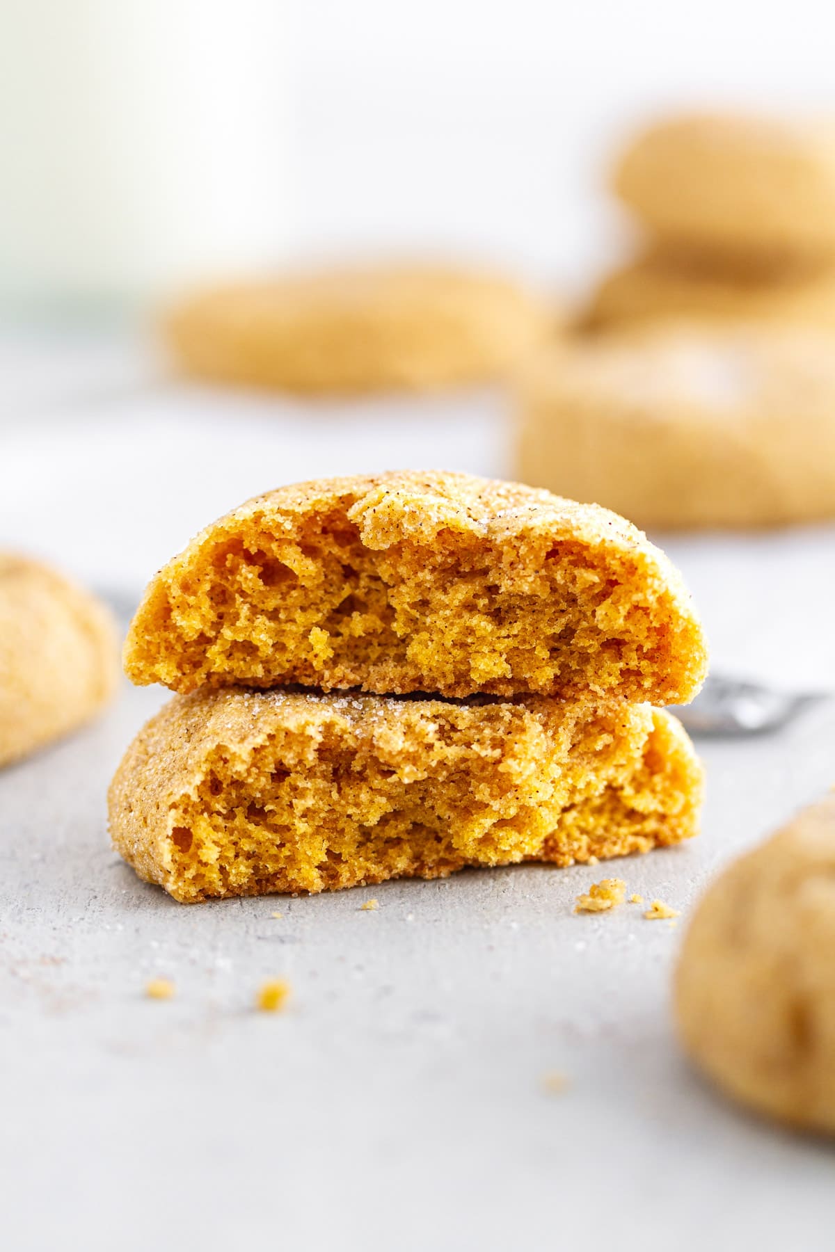 a pumpkin snickerdoodle cookie broken in half