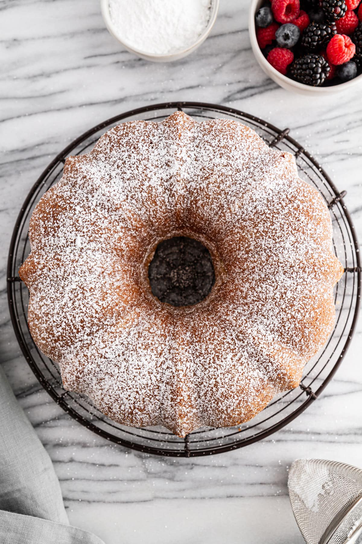 overhead shot of sour cream pound cake on a cooling rack