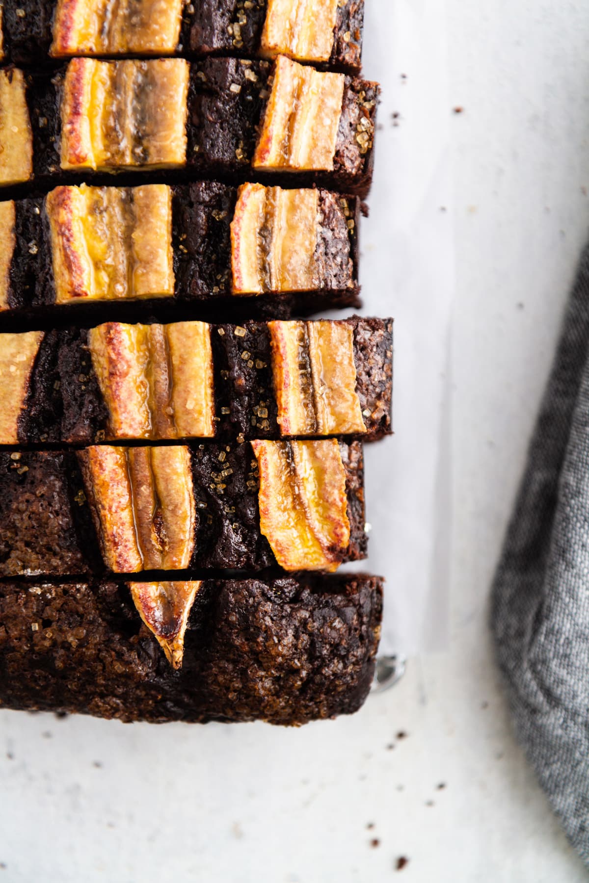 sliced chocolate banana bread on a surface