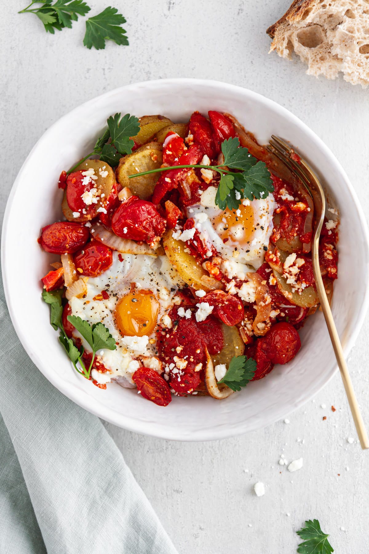 a bowl of shakshuka on a surface