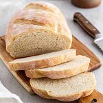 sliced Italian bread on a cutting board