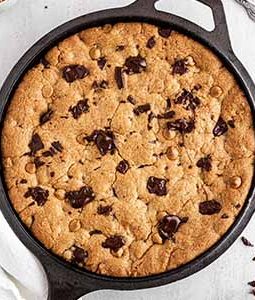 peanut butter chocolate skillet cookie on a surface