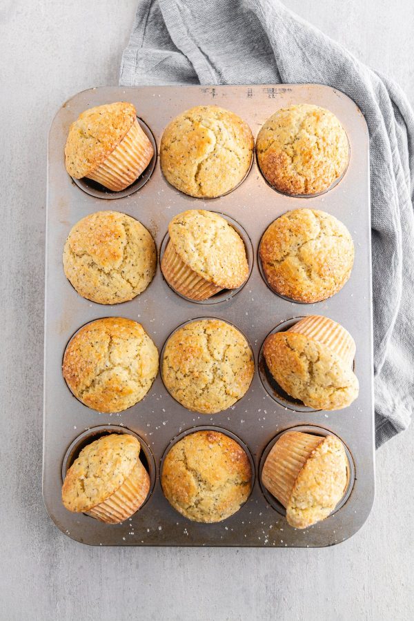 overhead shot of lemon poppy seed muffins in a muffin tin