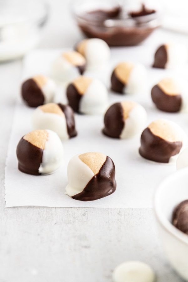 double chocolate buckeyes on parchment paper