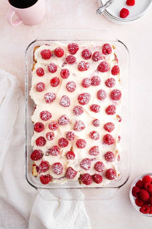 raspberry pound cake tiramisu in a baking dish on a surface