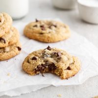 gluten free chocolate chip cookie with a bite taken out of it