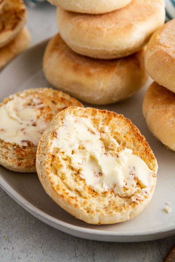 buttered English muffins on a plate