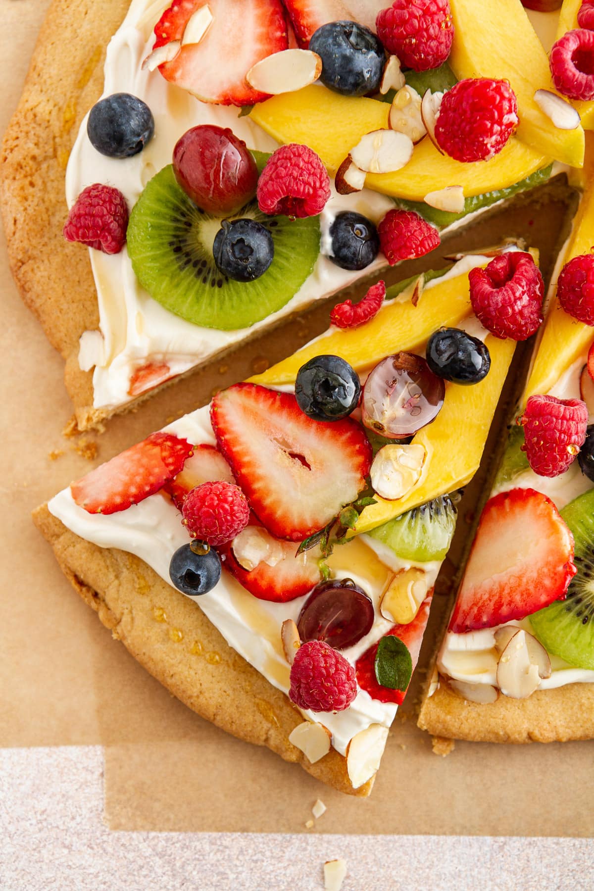 overhead shot of a slice of fruit pizza.