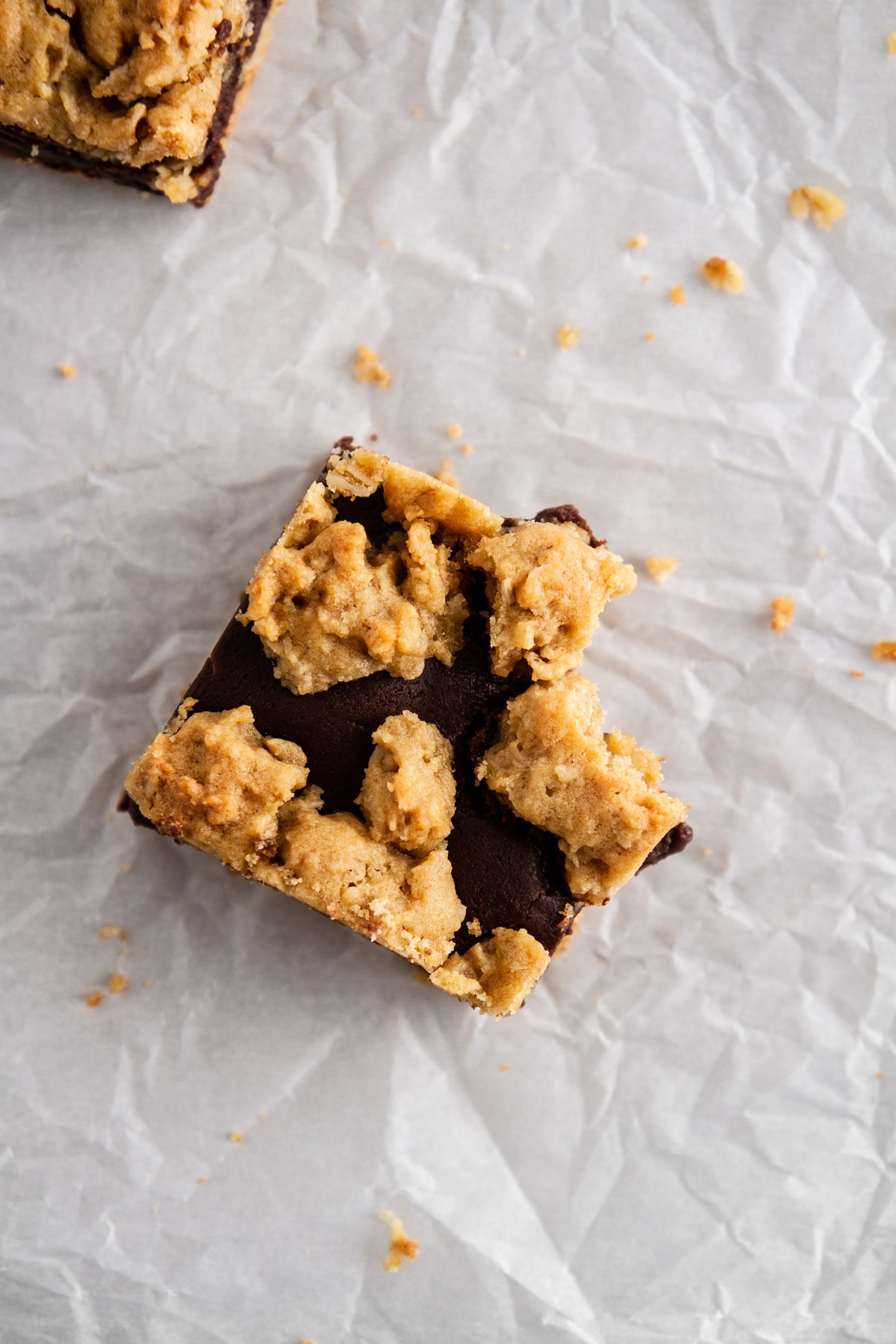 single revel bar on a surface with a bite taken out of it