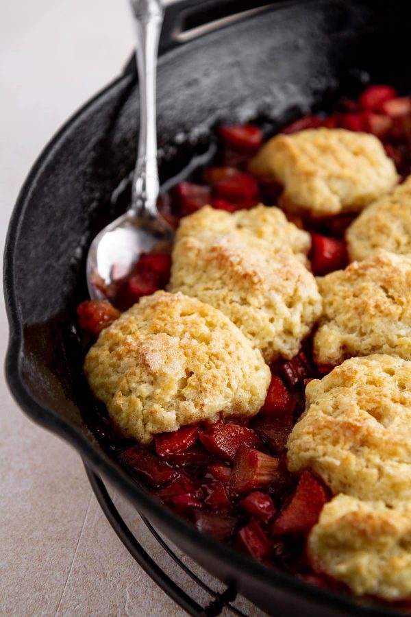 close-up of rhubarb cobbler in a cast-iron skillet