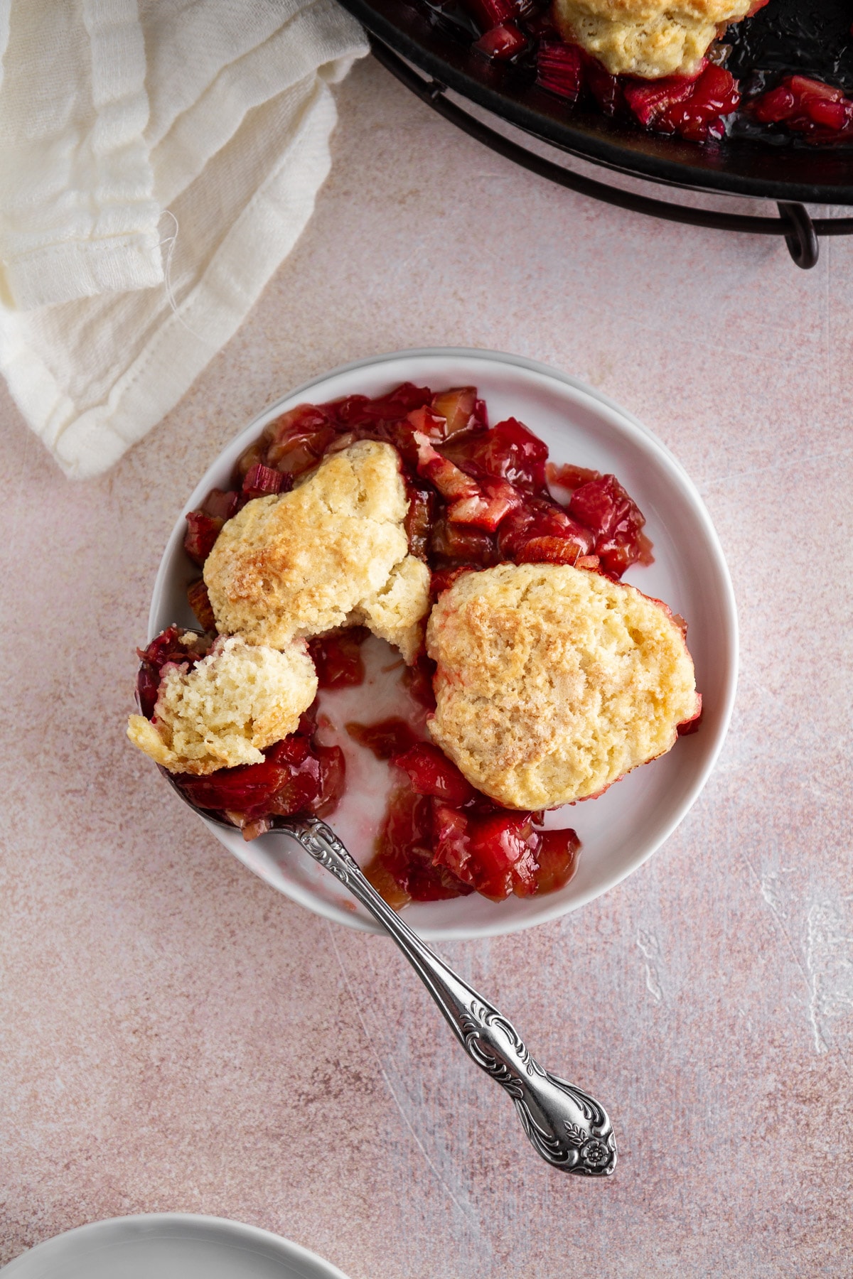 a plate of rhubarb cobbler.