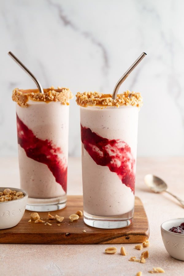 peanut butter and jelly milkshakes on a cutting board