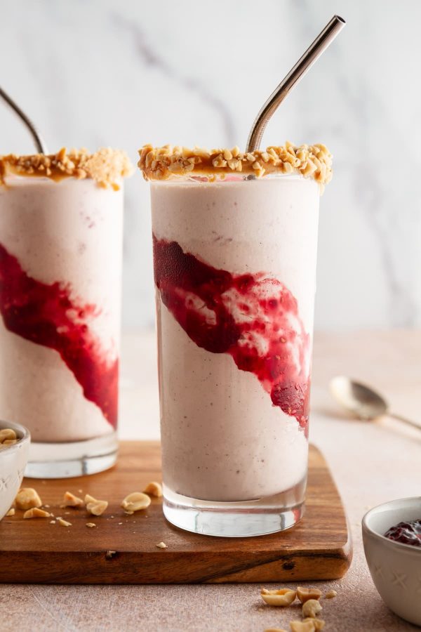 peanut butter and jelly milkshakes on a cutting board