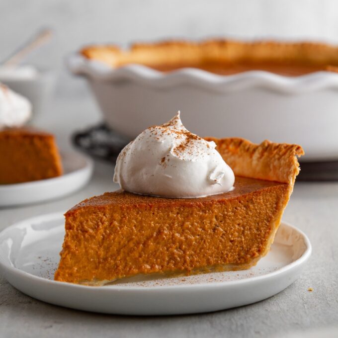 slice of pumpkin pie on a plate.