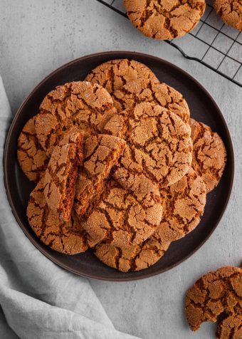 molasses cookies piled on a plate