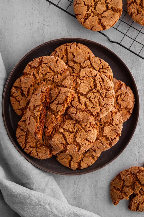 molasses cookies piled on a plate